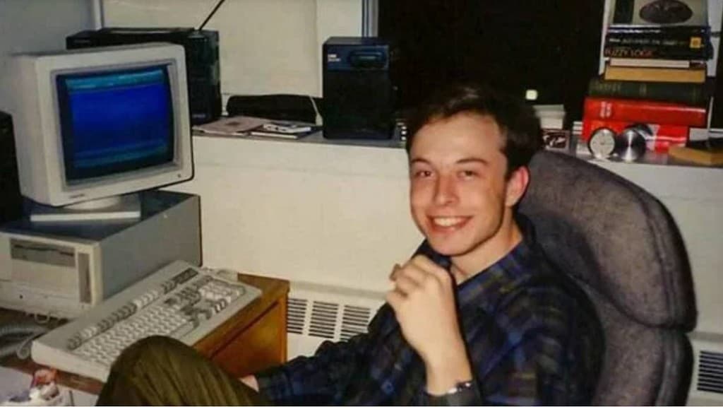 Young Elon Musk at an early computer